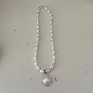 Fresh water pearl necklace with removable pendant.